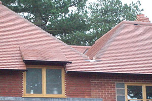 Close up image of a red tiled roof