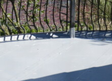 glass reinforced plastic roof with metal railings