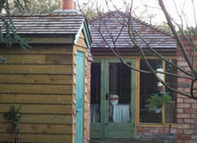 Wooden shed with green door