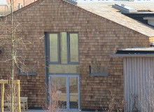 Roof Shingles on brick building